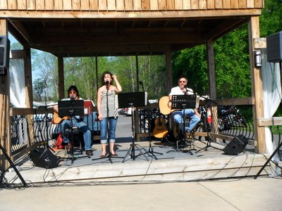 The Acoustic Jam at Aqua Sol first time on the patio this year. Tommy, John and Julie
