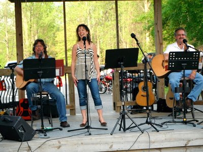 The Acoustic Jam at Aqua Sol first time on the patio this year. Tommy, John and Julie