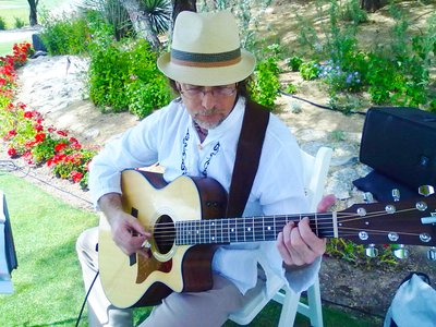Kevin playing at sister Mimi's wedding, 2012 May 5
