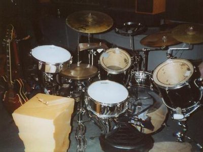 My Pearl kit w/ extra percussion, used for Reflecting Skin gigs, early 2000s